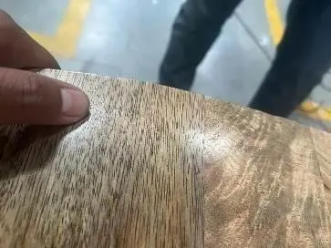 Minor defect: nails visible on a woven-panel sideboard