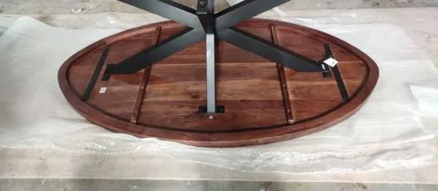 Cross-leg base fitted to the underside of an oval table top