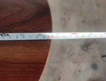 Measuring the width of an oval dining table top