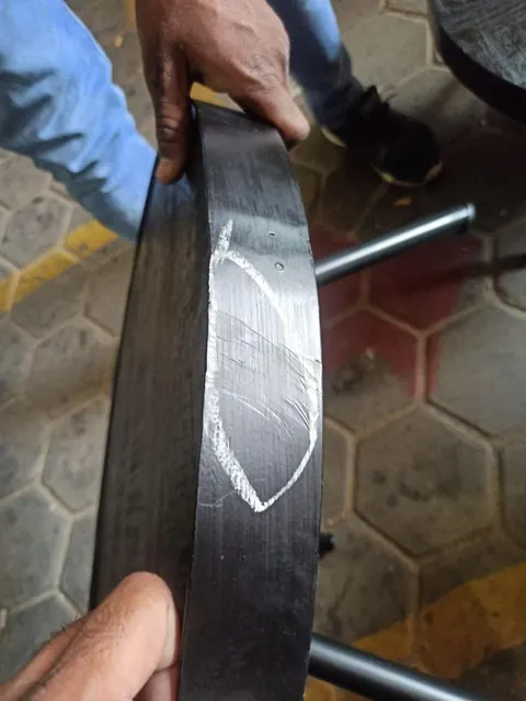 Defect on a wooden frame edge, marked in chalk during inspection