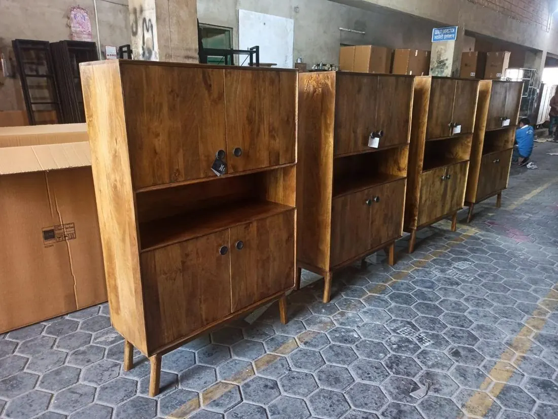 Row of wooden cabinets lined up for a random inspection