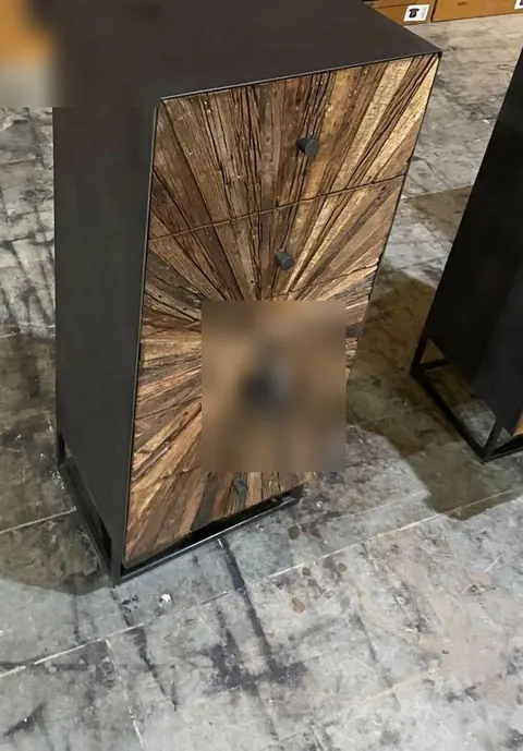 Critical defect: five-drawer cabinet that tips forward with all drawers open