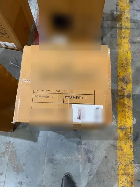 Carton mark checked; consignee and item details blurred