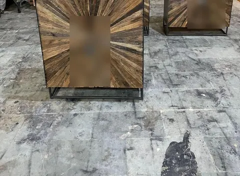 Wood and iron cupboard checked during inspection, label blurred