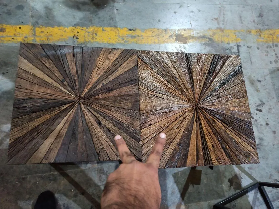 Major defect: two nesting table tops of different sizes compared side by side