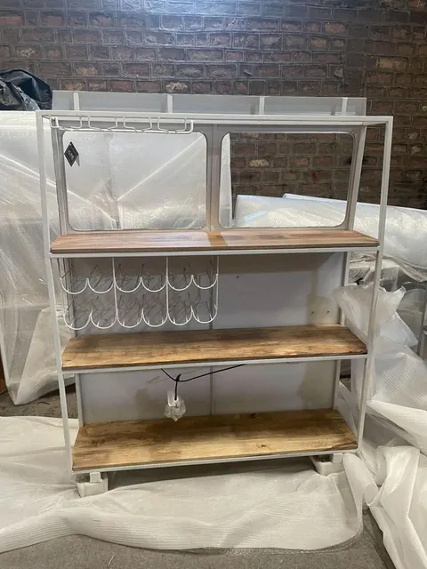 Rear shelving of a bar cabinet with wine rack